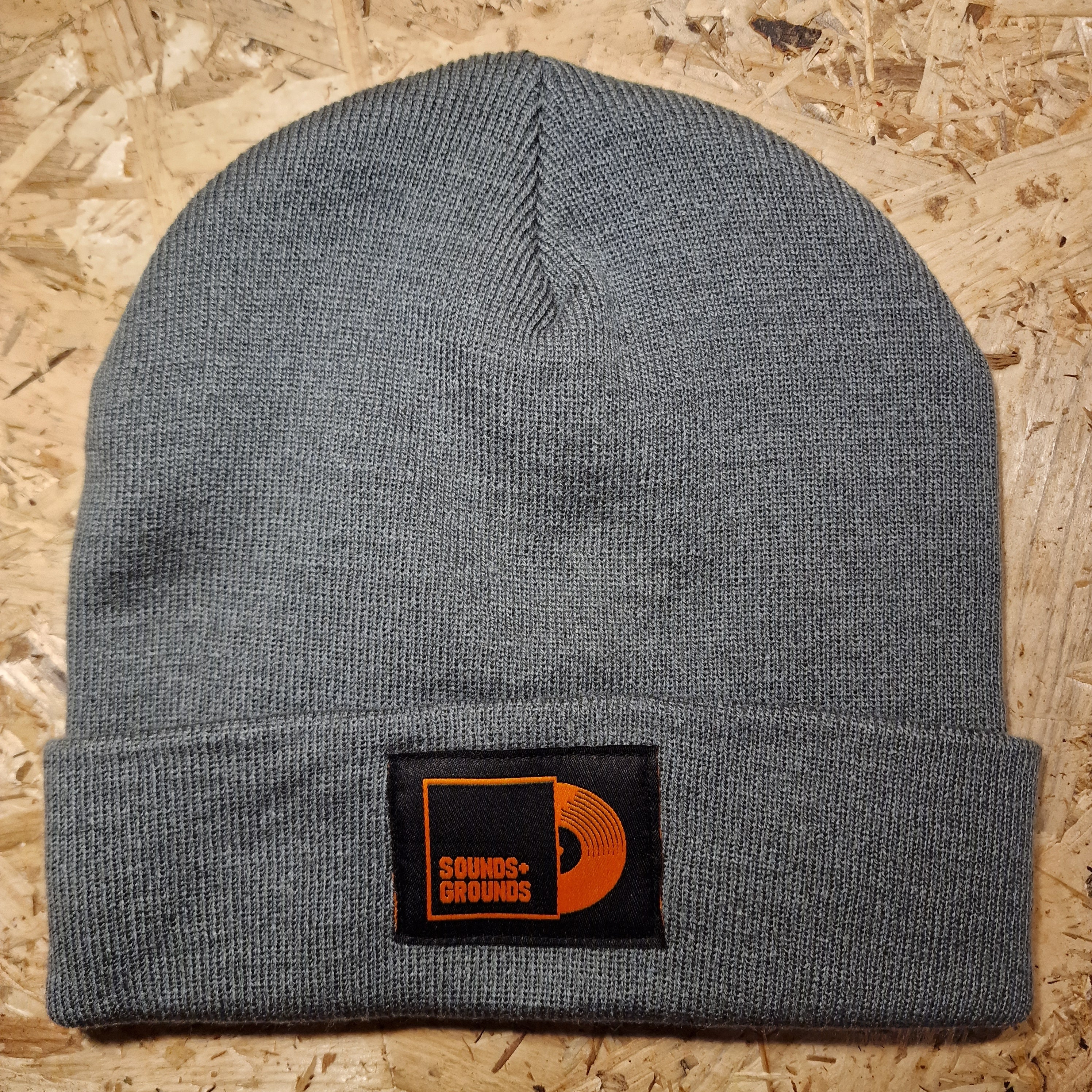 Sounds + Grounds Grey Beanie hat Black Logo (Front)