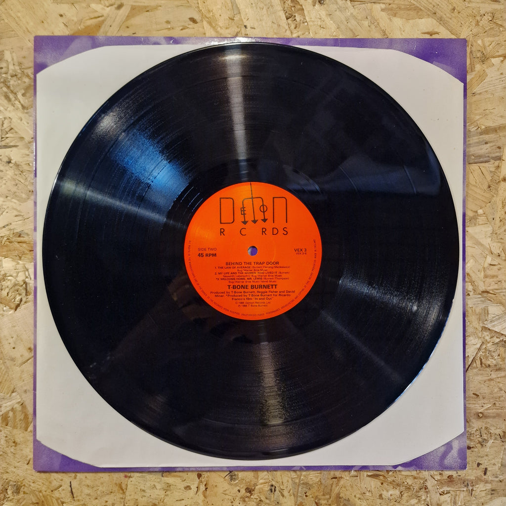 T-Bone Burnett – Behind The Trap Door