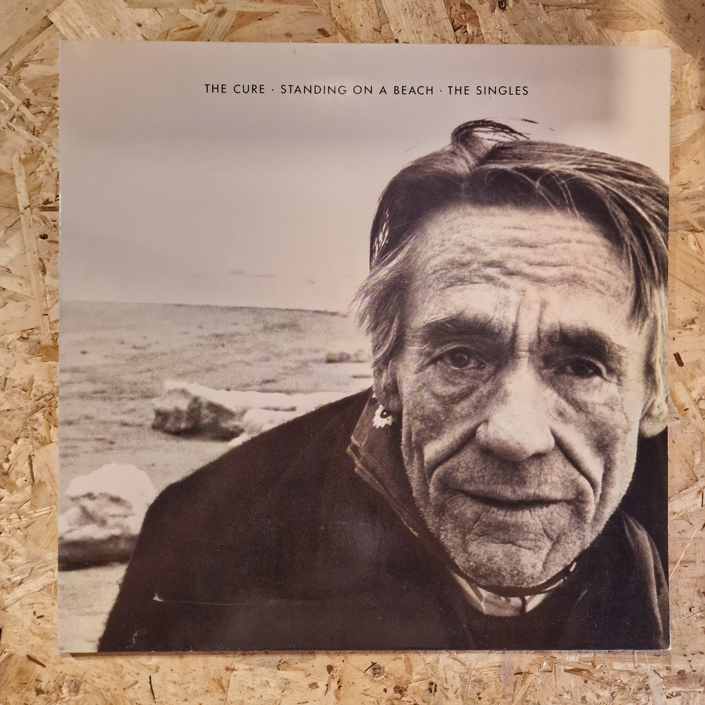 The Cure – Standing On A Beach · The Singles