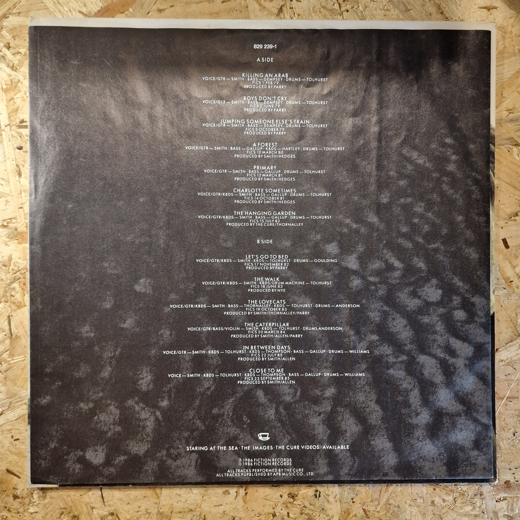 The Cure – Standing On A Beach · The Singles