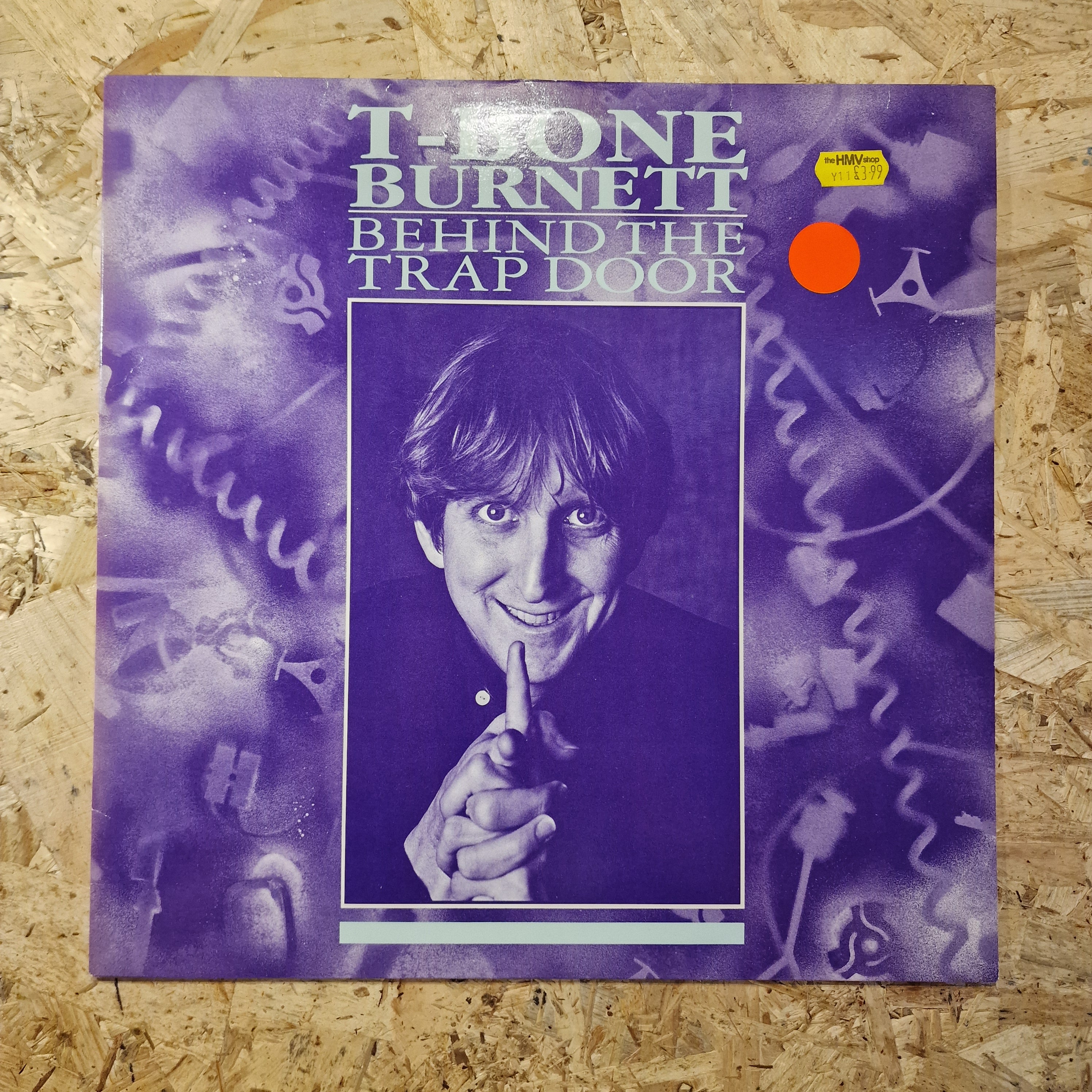 T-Bone Burnett – Behind The Trap Door