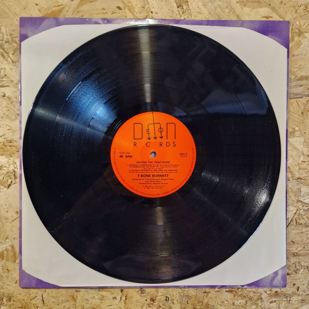 T-Bone Burnett – Behind The Trap Door