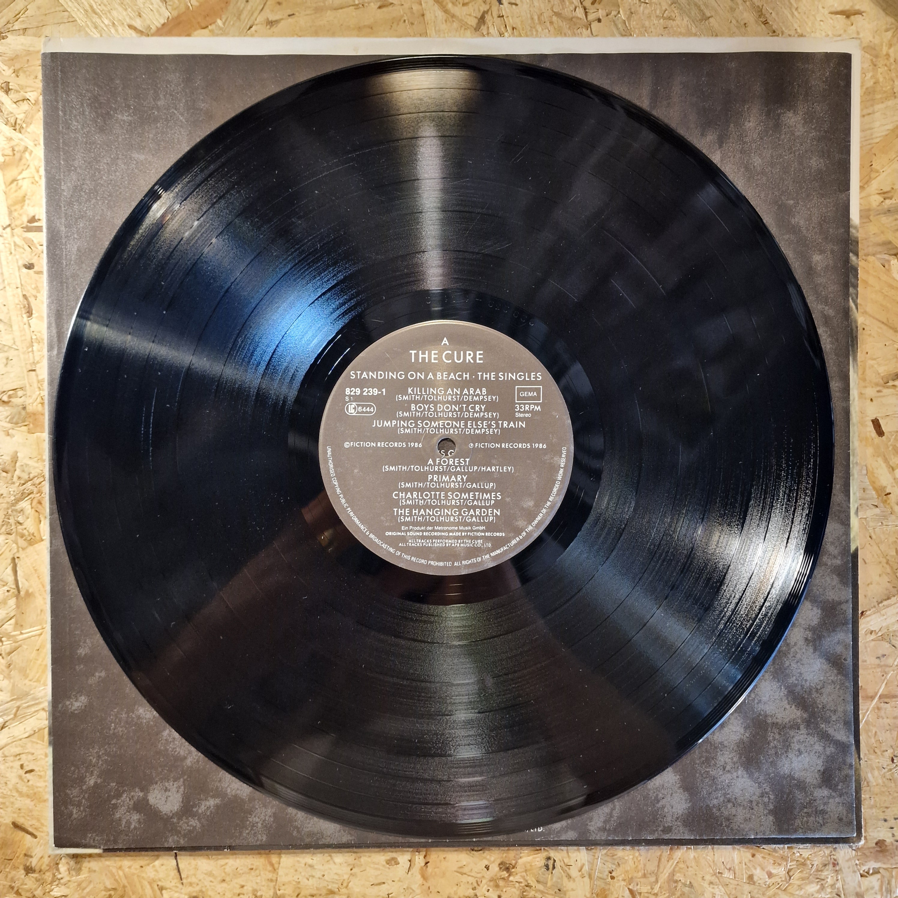 The Cure – Standing On A Beach · The Singles